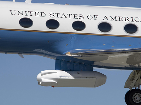 White UAVSAR radar pod mounted under the belly of the Gulfstream-III jet